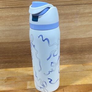 White and Blue Water Bottle with Ribbon Design